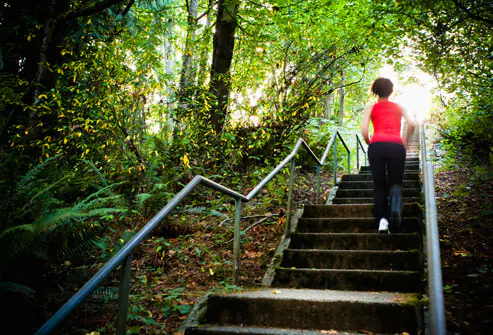 10 Ways to Reduce Stress & Revitalize Your Life Getty_rm_photo_of_woman_climbing_stairs