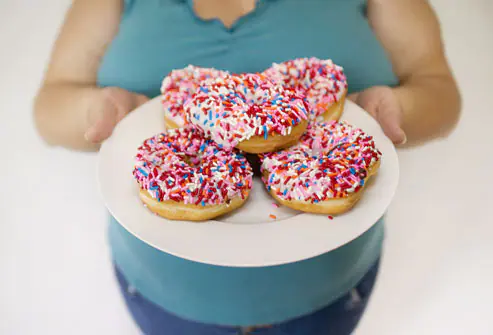 10 Ways to Reduce Stress & Revitalize Your Life Photolibrary_rf_photo_of_plate_of_donuts