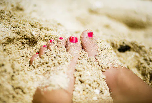 10 Ways to Reduce Stress & Revitalize Your Life Photolibrary_rm_photo_of_womans_feet_in_sand