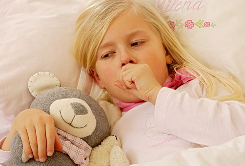 عبرى عن شعورك بصوره وكلمه Photolibrary_rm_photo_of_girl_coughing_in_bed