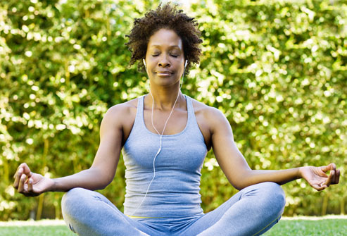 Top 24 Ways to Lose Weight Without Dieting Getty_rm_photo_of_woman_meditating