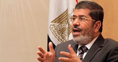 ننشر إعلان "مرسى" لحضور جلسة دعوى إسقاط الجنسية الأمريكية عن ابنيه S9201213121135