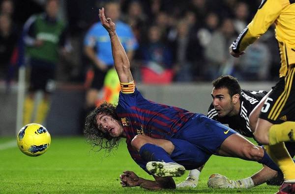 صور مبارة ريال سرقسطة من الموندو  Carles-Puyol-consigue-el-terce_54239110706_54115221154_600_396