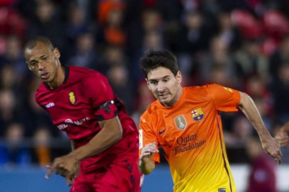 بالصور : اقوى لحظات مباراة البارسا ضد مايوركا  Leo-Messi-se-va-del-defensa-br_54355092222_54115221152_960_640