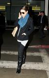 Mila Kunis Th_43814_Preppie_-_Mila_Kunis_arrives_into_LAX_Airport_-_Feb._9_2010_912_122_19lo