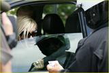 May 22nd : New pix (Driving test day + With the policeman) Th_04880_victoria-beckham-speeding-ticket-27_122_1001lo