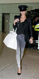 Victoria traveling to London (14.5.2009) Th_15802_celeb-city.org-The_Elder-Victoria_Beckham_2009-05-14_-_Arriving_At_Heathrow_Airport_337_122_901lo