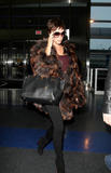 Victoria leaving NY and arriving in LA (feb 18th) Th_78851_celeb-city.org_Victoria_Beckham_arriving_JFK005_122_785lo