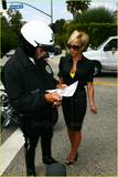 May 22nd : New pix (Driving test day + With the policeman) Th_04523_victoria-beckham-speeding-ticket-03_122_550lo