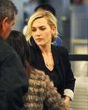 Golden Globes 2010 - Page 5 Th_54009_Preppie_-_Kate_Winslet_departs_LAX_Airport_-_Jan._17_2010_295_122_866lo