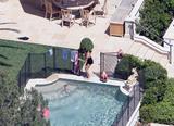 April 19th; Victoria pictured @ the pool, L.A Th_08725_celeb-city.org_Victoria_Beckham_pool_american_057_123_116lo