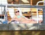 Njene slike...[molim bez komentara] - Page 2 Th_08006_Celebutopia-Britney_Spears_relaxing_in_her_bikini_by_the_pool_in_Miami-09_122_254lo