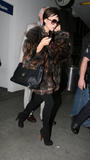 Victoria leaving NY and arriving in LA (feb 18th) Th_79048_celeb-city.org_Victoria_Beckham_arriving_JFK021_122_58lo