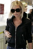 October 13th, VB @ Heathrow Airport & @ LAX airport Th_51832_Victoria_Beckham_leaves_Heathrow_to_LA_07_123_765lo