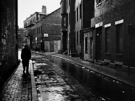 setting and point Walker-evans-rain-slicked-street-scene-in-poor-section-of-city-in-eastern-us