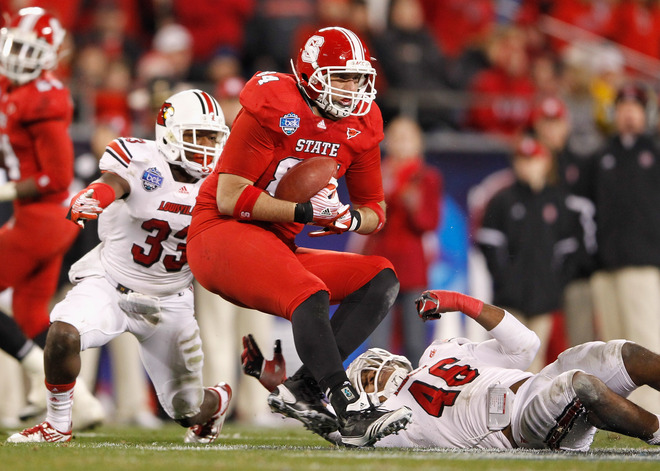 NC State hangs on to beat Louisville in Belk Bowl, 31-24 71668c1c6a7baa34110f4a2b0d65eb40-getty-136157647