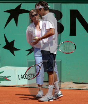 Mirka entrenando con Roger 44