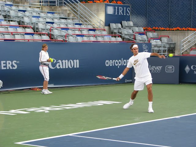 Mirka entrenando con Roger 49