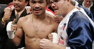 Pacquiao con problemas fiscales Manny-pacquiao-and-freddie-roach-397x210