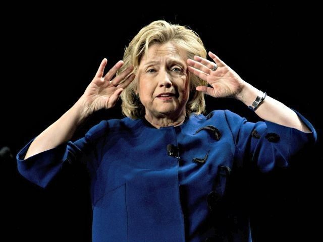 Trump threatens to sue NY Times.  Times says: "Go fuck yourself." Hillary-Clinton-fingertips-to-head-AP-Photo-640x480-640x480