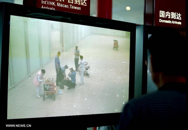 Người đi xe lăn đánh bom tự sát ở sân bay Bắc Kinh Beijing-explode-9838e