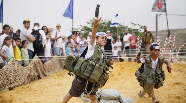   PMW Bulletins PA-Fatah summer camp for kids: AK-47 automatic weapons and youth in military uniforms dancing with rifless   	 W-kids-to-hate.jpg