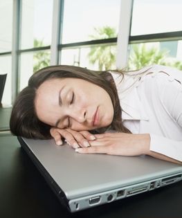 Best strategies to survive a business day in London Sleep-on-laptop-in-office