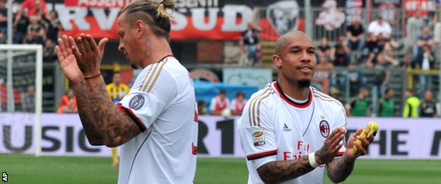 How can racism be dealt with once and for all? - Page 3 _74775732_philippe_mexes_nigel_de_jong_ap