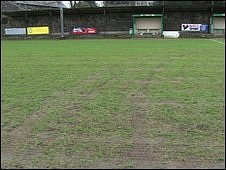 Police investigate damage to a Guernsey football pitch _47525133_groundsman