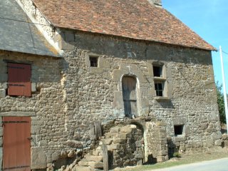 La Maison De Smullyan Et sa Boutique de Tisserand