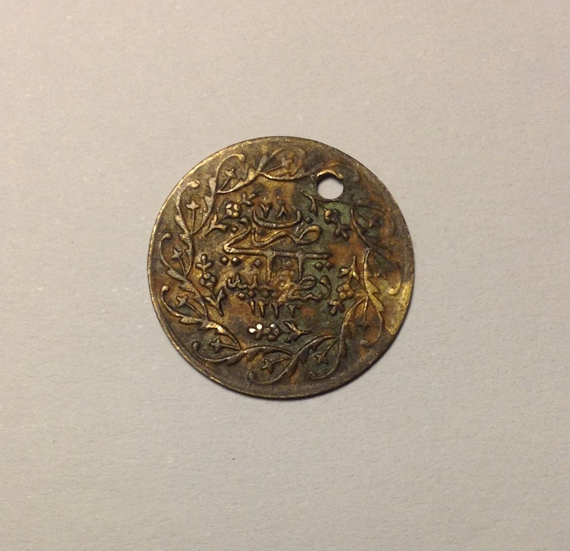 Medalla-moneda árabe a identificar 2wf4o45