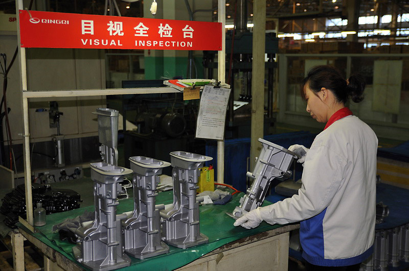 Qingqi motos Visita a la fábrica CBP_JN_EngineFac-17