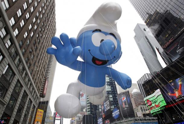 Thanks Again CCT`s For Another Inappropriate Front Page Item The-Smurf-balloon-floats-down-the-parade-route-at-the-Macys-84th-Annual-Thanksgiving-Day-Parade-in-New-York