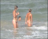 Family nudism. Naked nudists with their naked children.Dressed With A Smile 1054980-thumb