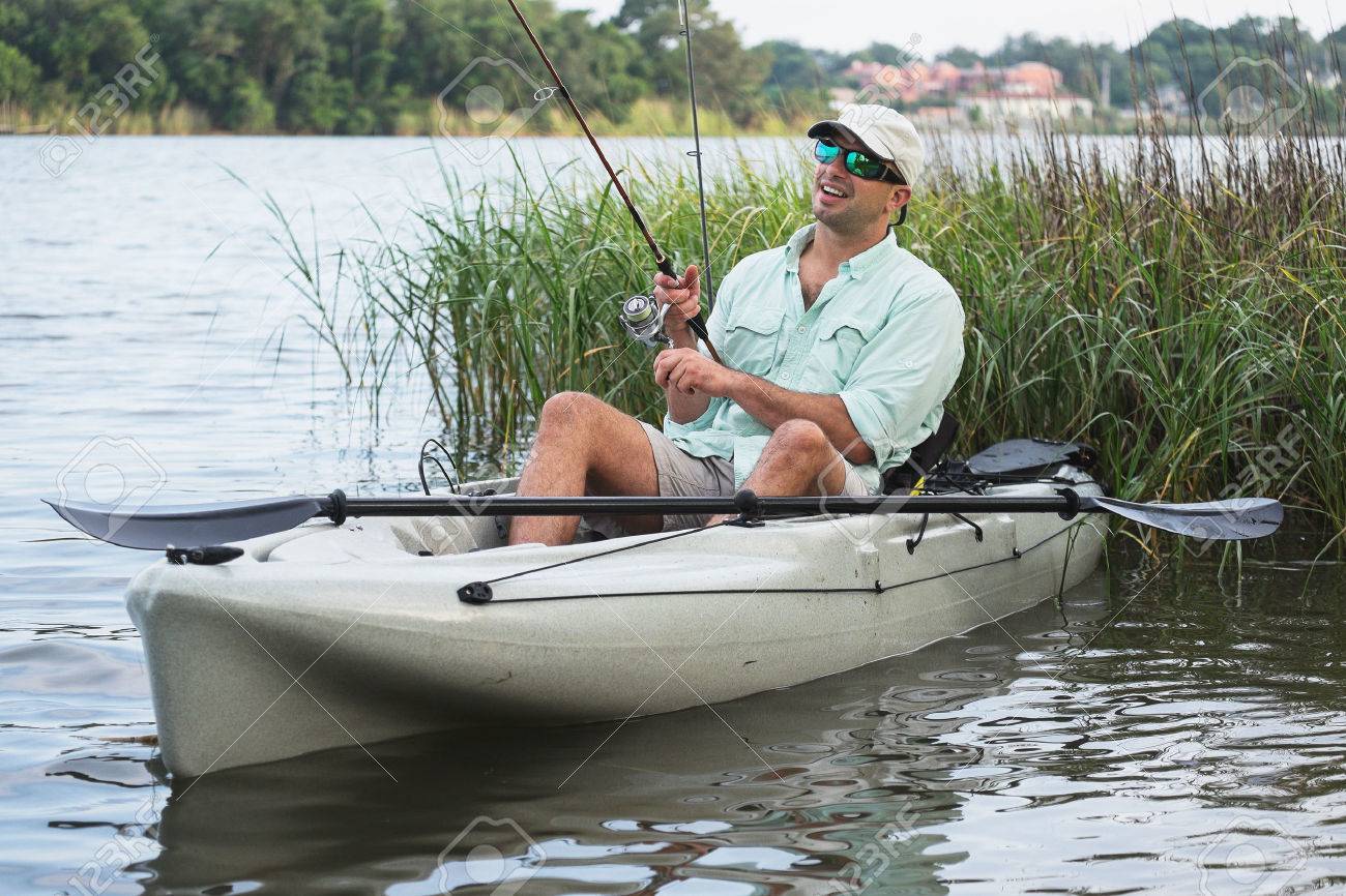 Bring Back Boggers - Page 3 29301666-Man-fishing-from-kayak-on-a-beautiful-day-at-sunset--Stock-Photo