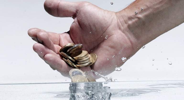 golf - Agua y capital en España - Página 3 Agua-mano-dinero-getty