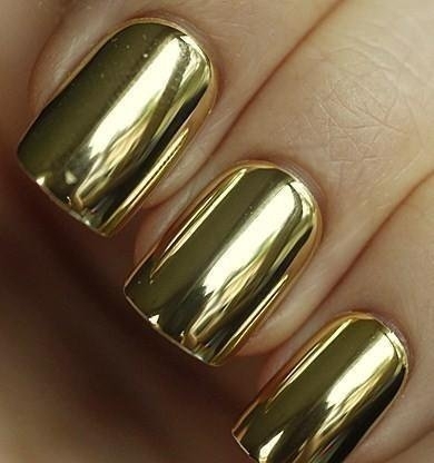 فيديو طريقة وضع المناكير المرايه - القصدير .. :)  Awesome-cosmetics-gold-nail-polish-style-Favim.com-269978