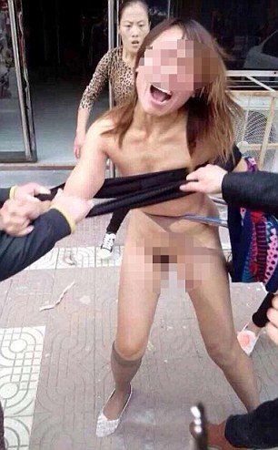 TIONG NEWS: Chinese 'mistress' is stripped naked and beaten senseless in backlash against booming country's 'concubine culture' 1413210840321_wps_87_Pic_shows_Lin_Yao_Li_who