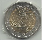 que me podeis decir de esta moneda Moneda_italiana_conmemora_r