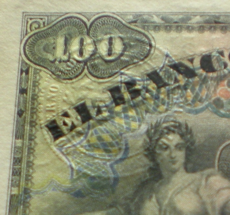 100 pesetas 1907 (sello seco República) Sello_seco_recortado