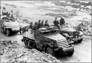 Surviving Self-propelled Guns based on US Half-Tracks Rommel_in_Tunisia_speaking_with_troops_riding_a