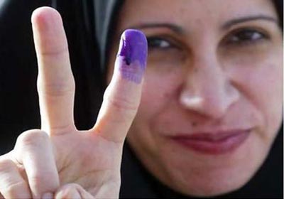 محللون دوليون: نجاح الانتخابات البرلمانية سيكبح جماح خسائر اقتصاد مصر  Election_iraqi_woman_324415262