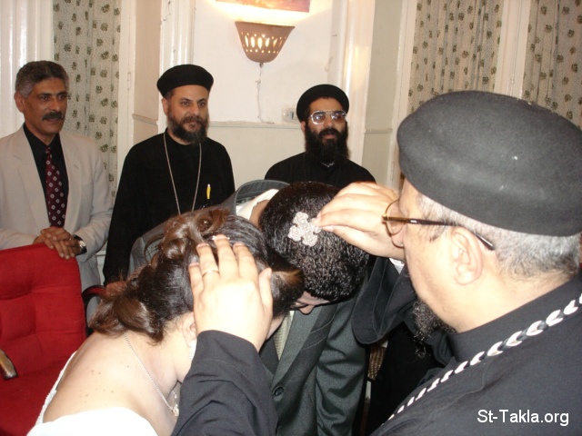     سؤال: هل يمكن الزواج من غير المؤمنين؟ ولماذا؟ St-Takla-org___Coptic-Orthodox-Marriage-Wedding-04-Engagement