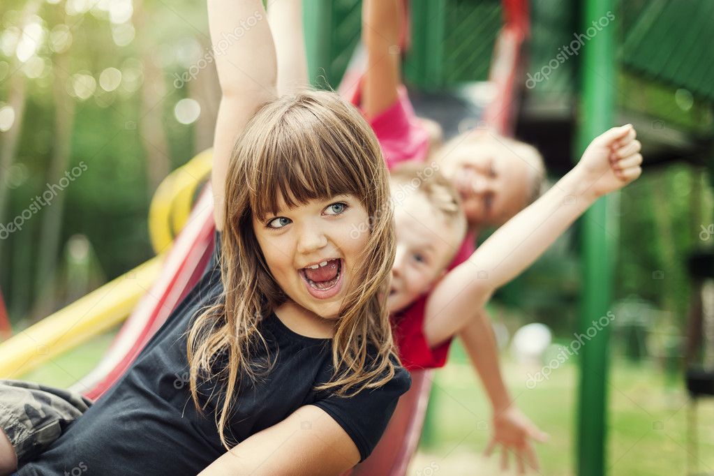 زينة الحياة الدنيا .. - صفحة 50 Depositphotos_21902543-Kids-having-fun-on-slide