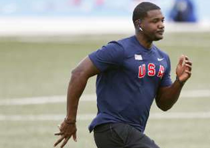 Justin Gatlin coached by Dennis Mitchell 1688064