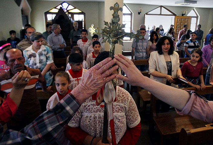 Easter around the world – in pictures Iraqi-Christians-celebrat-001