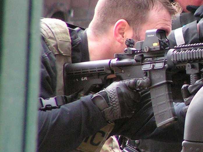 SWAT Officer At Armed Standoff Has His Rifle Sight On Backward Riflesight-1