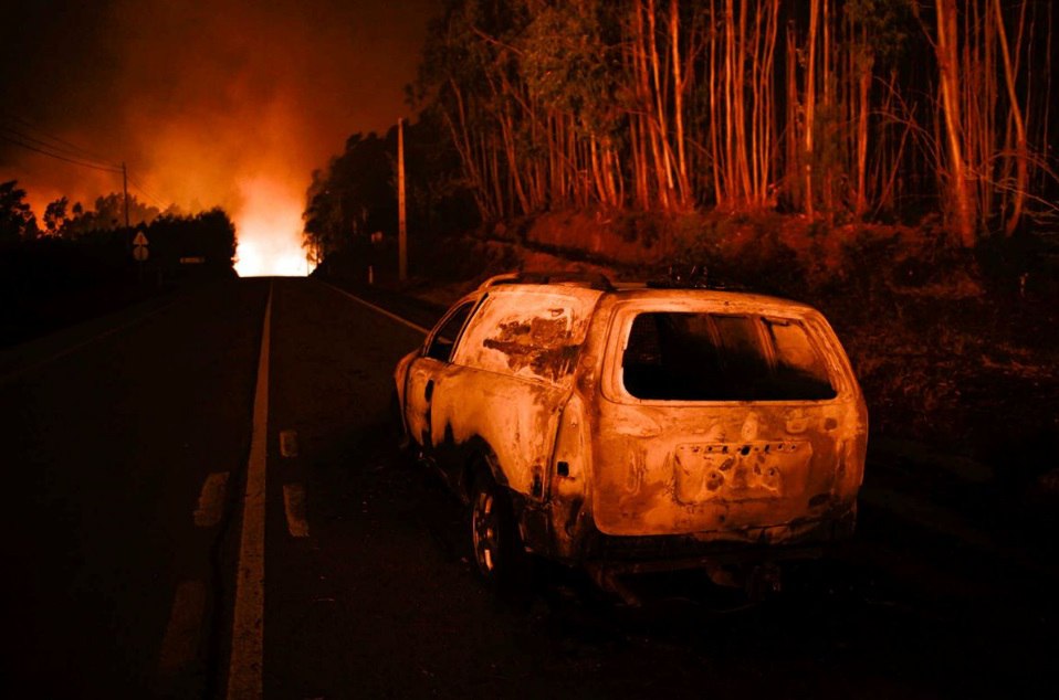 Huge forest fires in Portugal kill more than 60 people mostly in cars trying to flee the inferno Portugal-fire-1