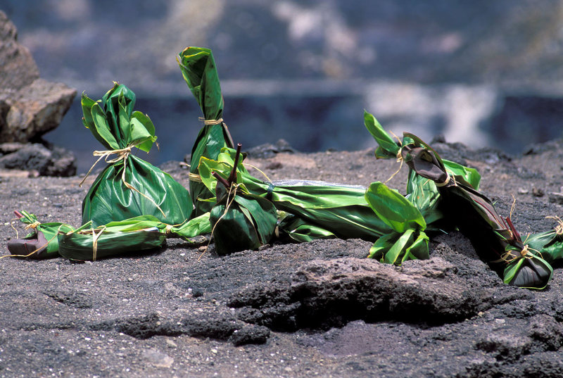 Why Hawaiians place plants before a wall of hot lava in Hawaii Offerings-ti-leaves-hawaii-volcano-eruption-1