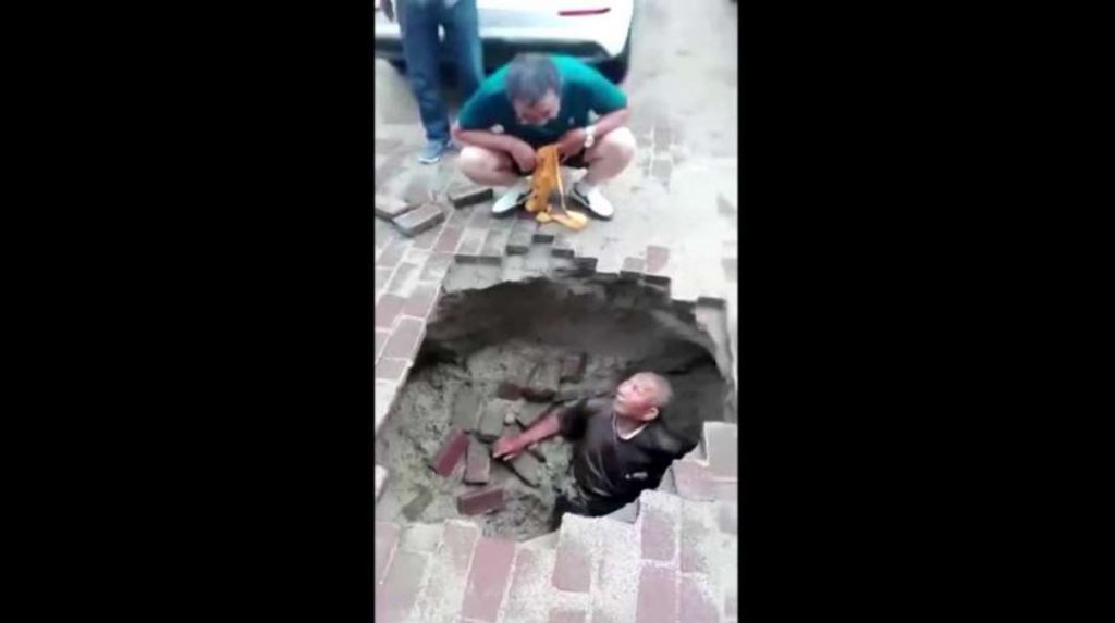 Elderly man suddenly swallowed by sinkhole that appeared with no warning beneath his feet Man-swallowed-by-sinkhole-china-july-2018-1024x573